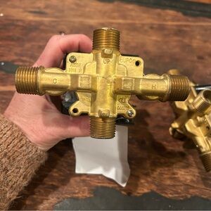 brass pressure-balancing tub and shower valve